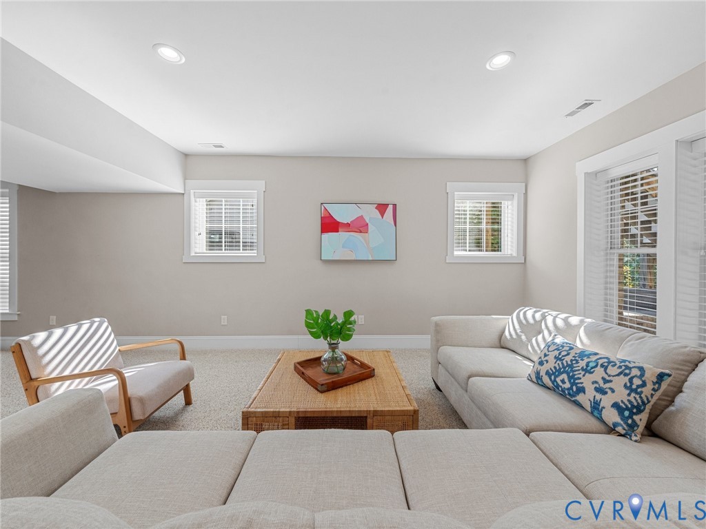 16125 Binley Road Midlothian, VA 23112 - Photo 42 of 50 a living room with furniture and a couch