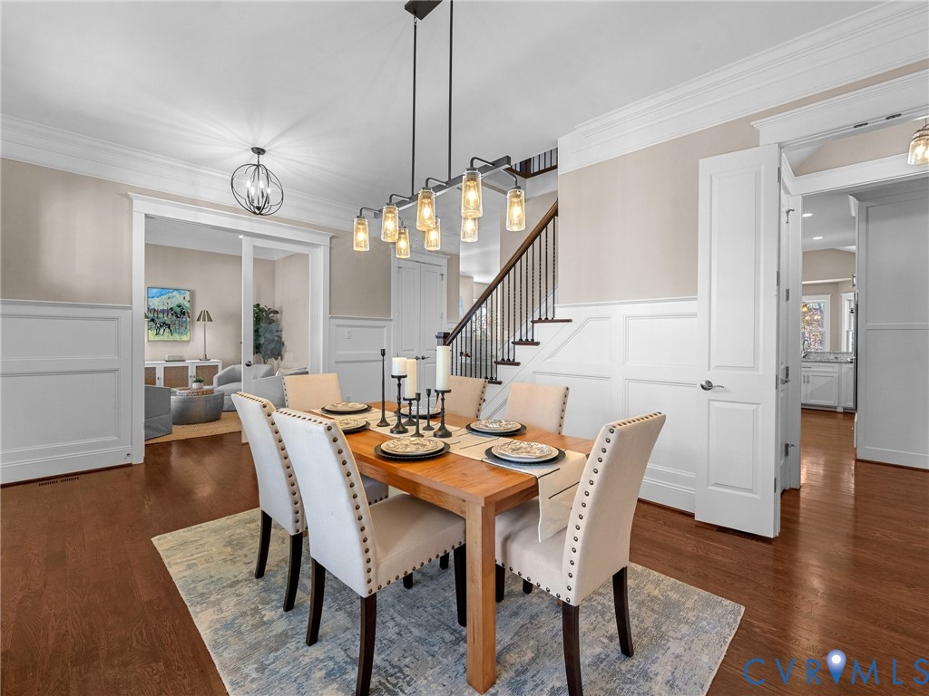 16125 Binley Road Midlothian, VA 23112 - Photo 8 of 50 a view of a dining room with furniture and wooden floor