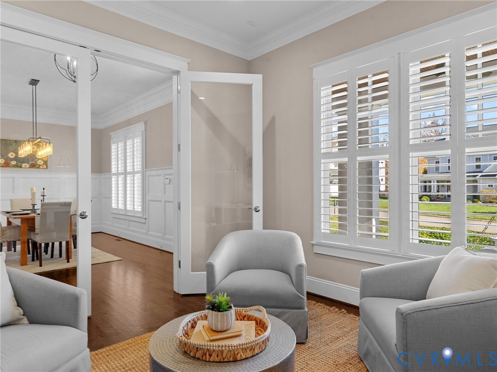 16125 Binley Road Midlothian, VA 23112 - Photo 10 of 50 a living room with furniture and a large window