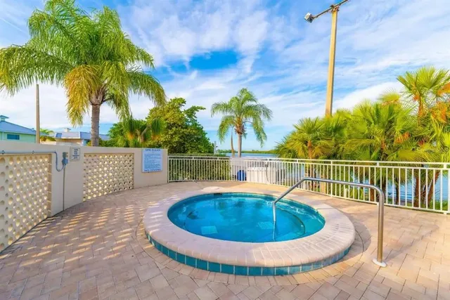 a view of a swimming pool with a chair