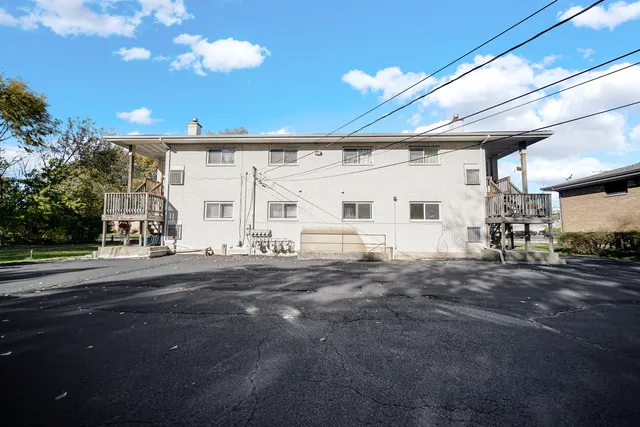 a view of a house with a street
