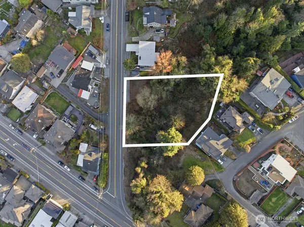 an aerial view of a house with a garden