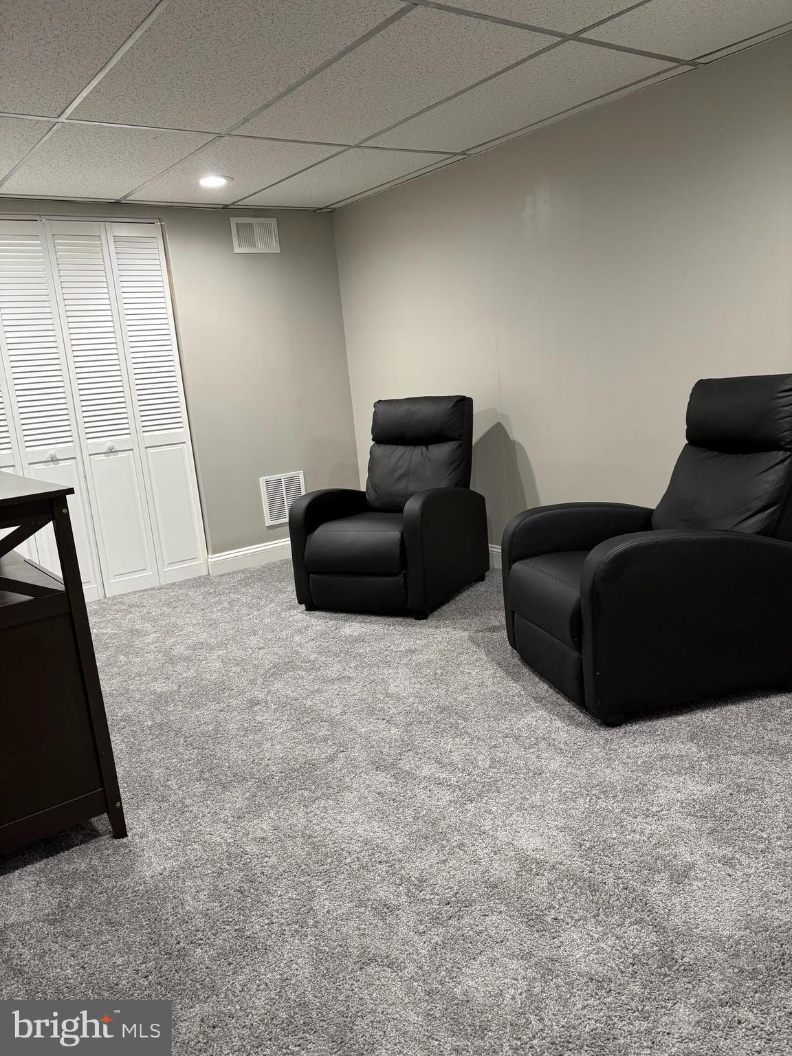 3541 Benzinger Road Baltimore, MD 21229 - Photo 29 of 33 a living room with furniture and a rug