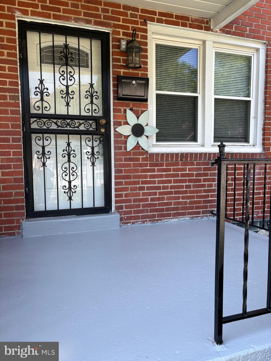 3541 Benzinger Road Baltimore, MD 21229 - Photo 5 of 33 a view of front door of house with wooden floor