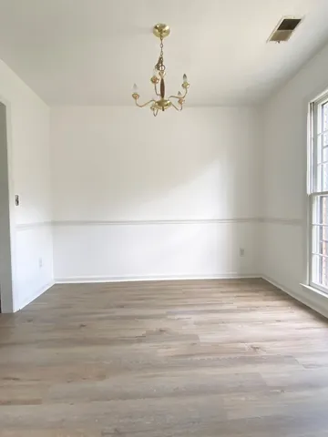 a view of a room with an empty space