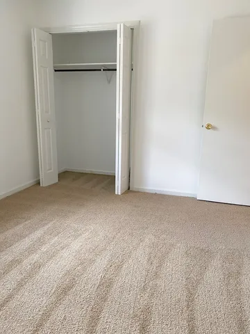 an empty room with closet