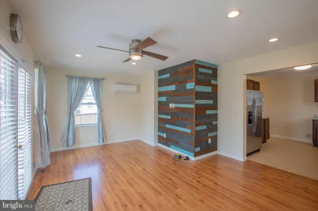a bedroom with furniture and window