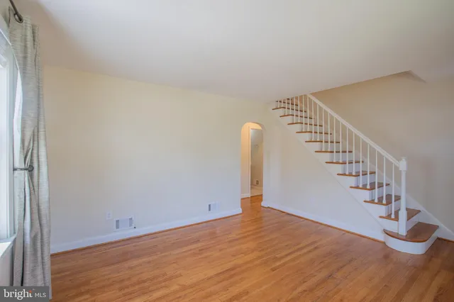 a view of entryway with wooden floor