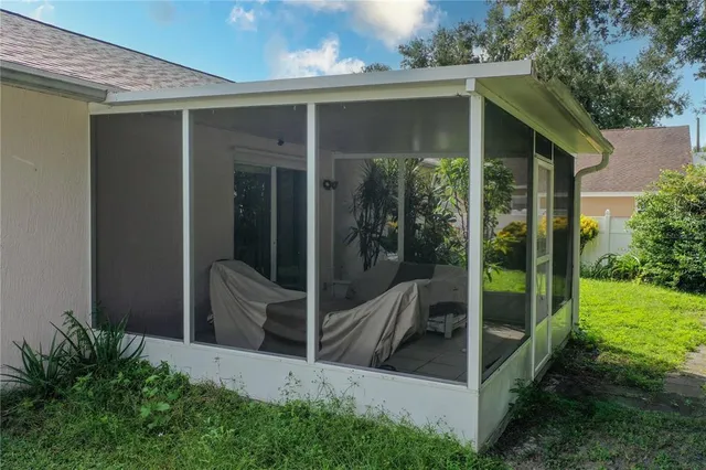 a view of backyard with green space