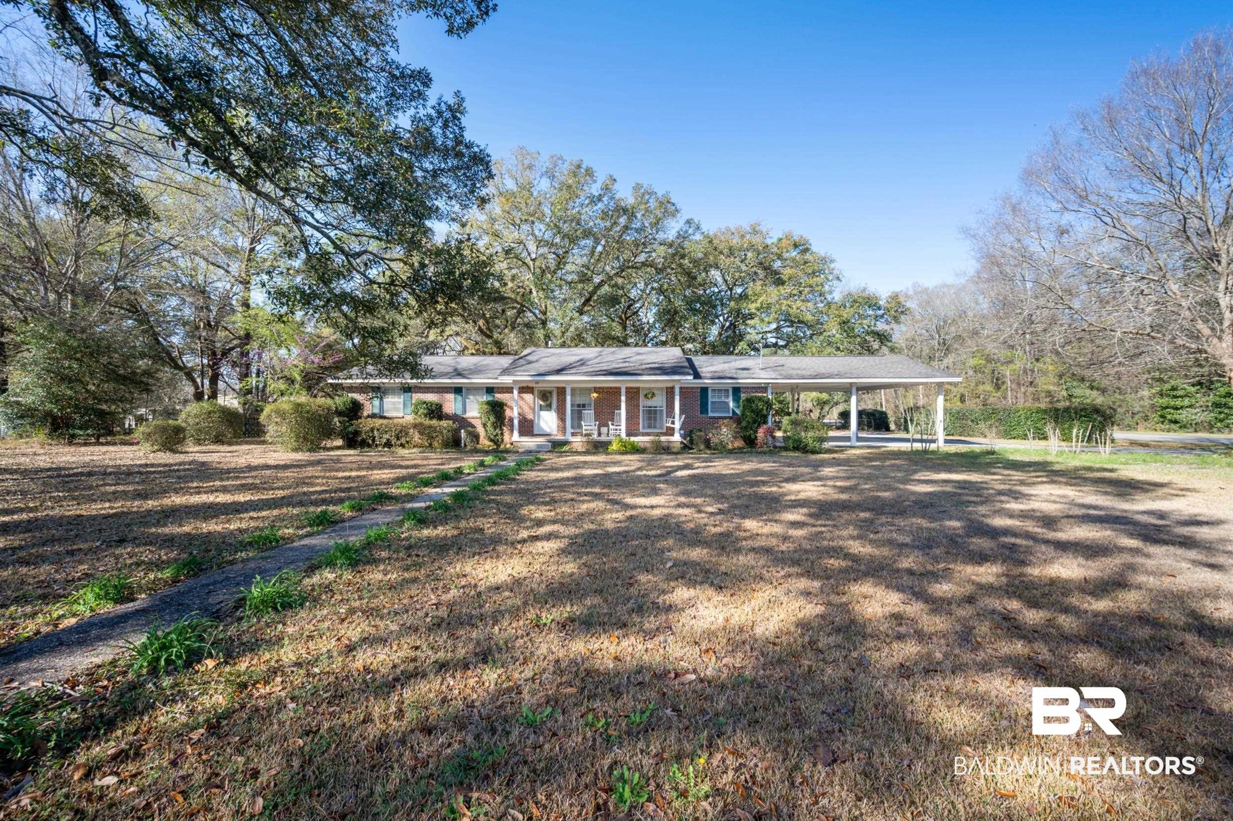 809 Moog Avenue Bay Minette, AL 36507 - Photo 3 of 33 Ranch-style house with covered porch and an attached carport