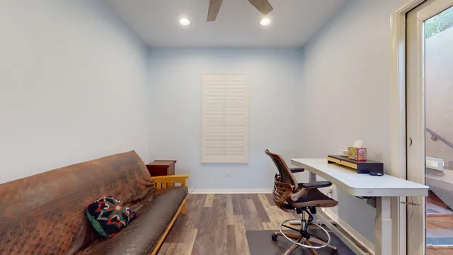 a view of a swimming pool with a yard