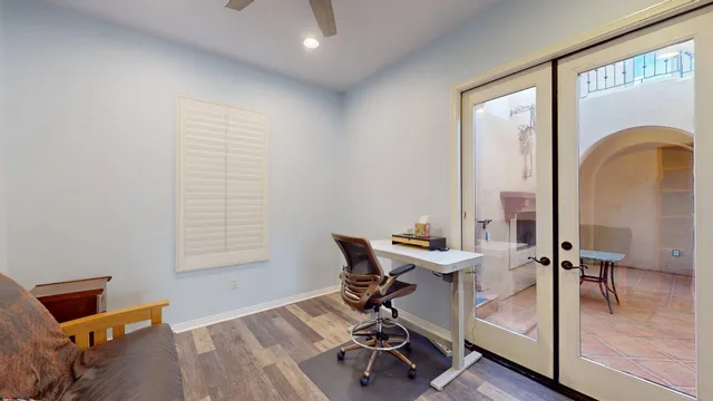 a view of a bathtub and bench in the garden