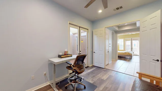 swimming pool view with a garden space