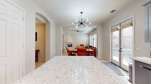 a bed room with a bed and a mirror