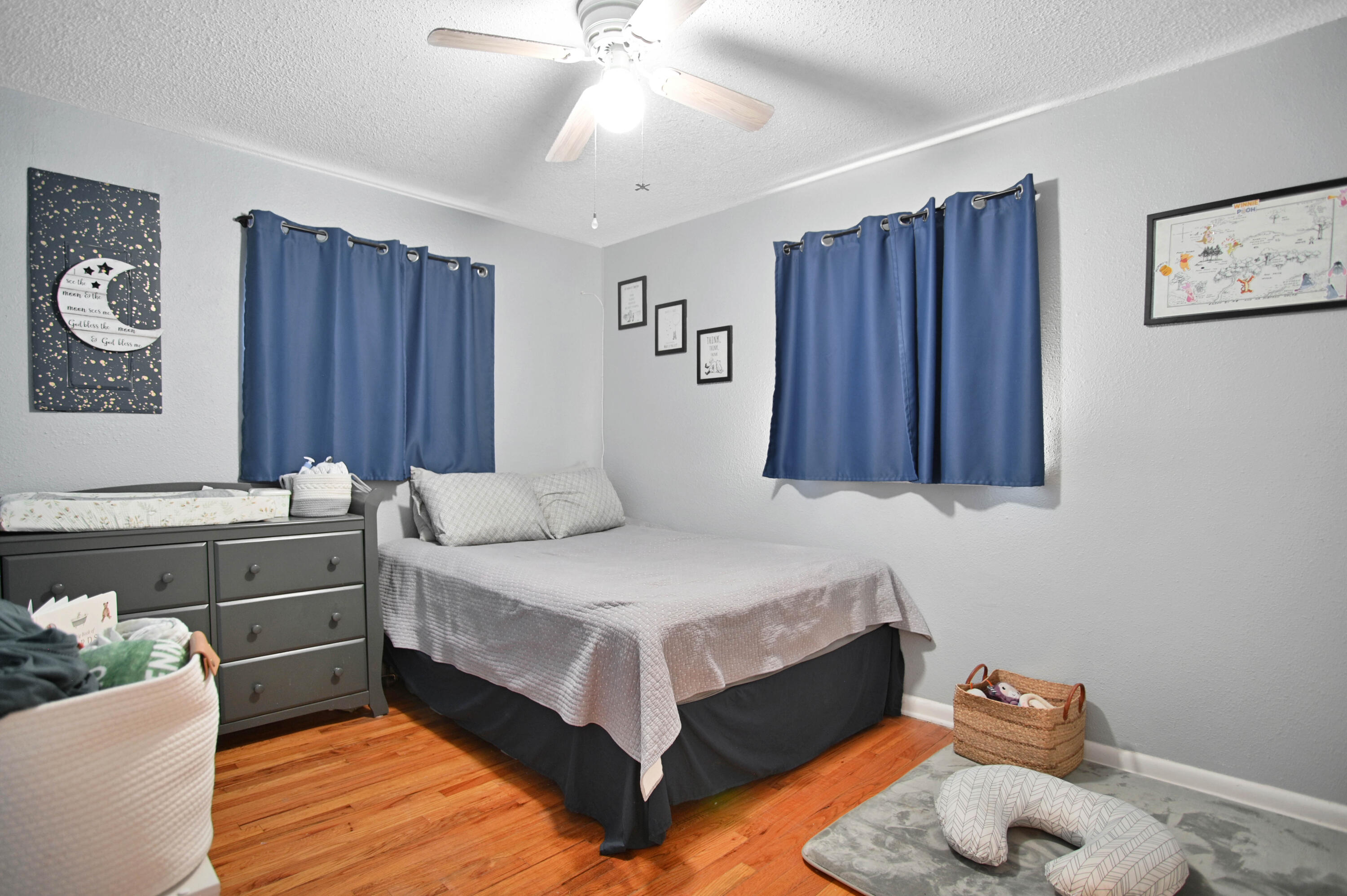 704 4th Street Smyer, TX 79367 - Photo 12 of 38 a bedroom with a bed and a cabinets