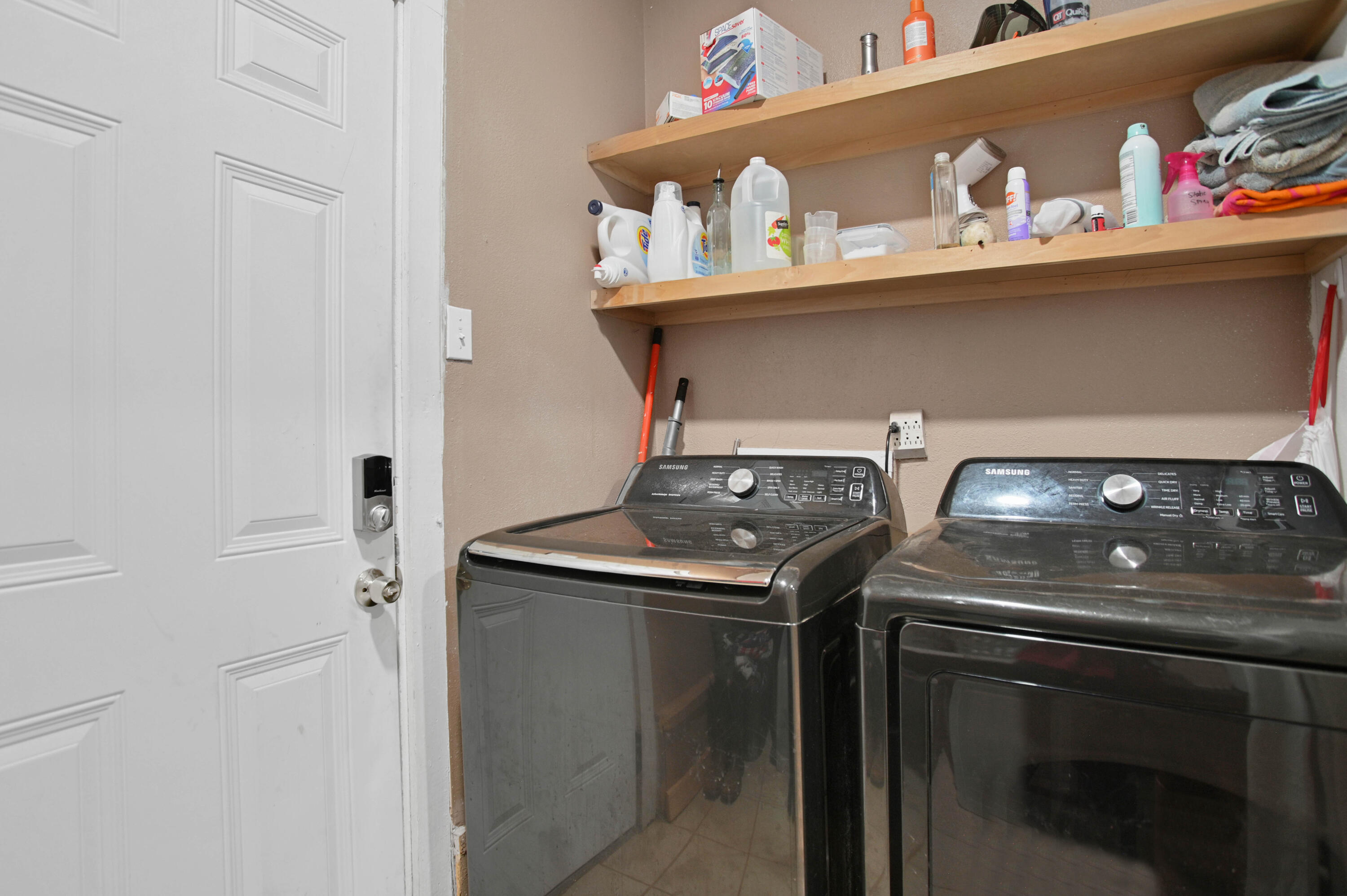 704 4th Street Smyer, TX 79367 - Photo 25 of 38 a close view of laundry room with washer and dryer