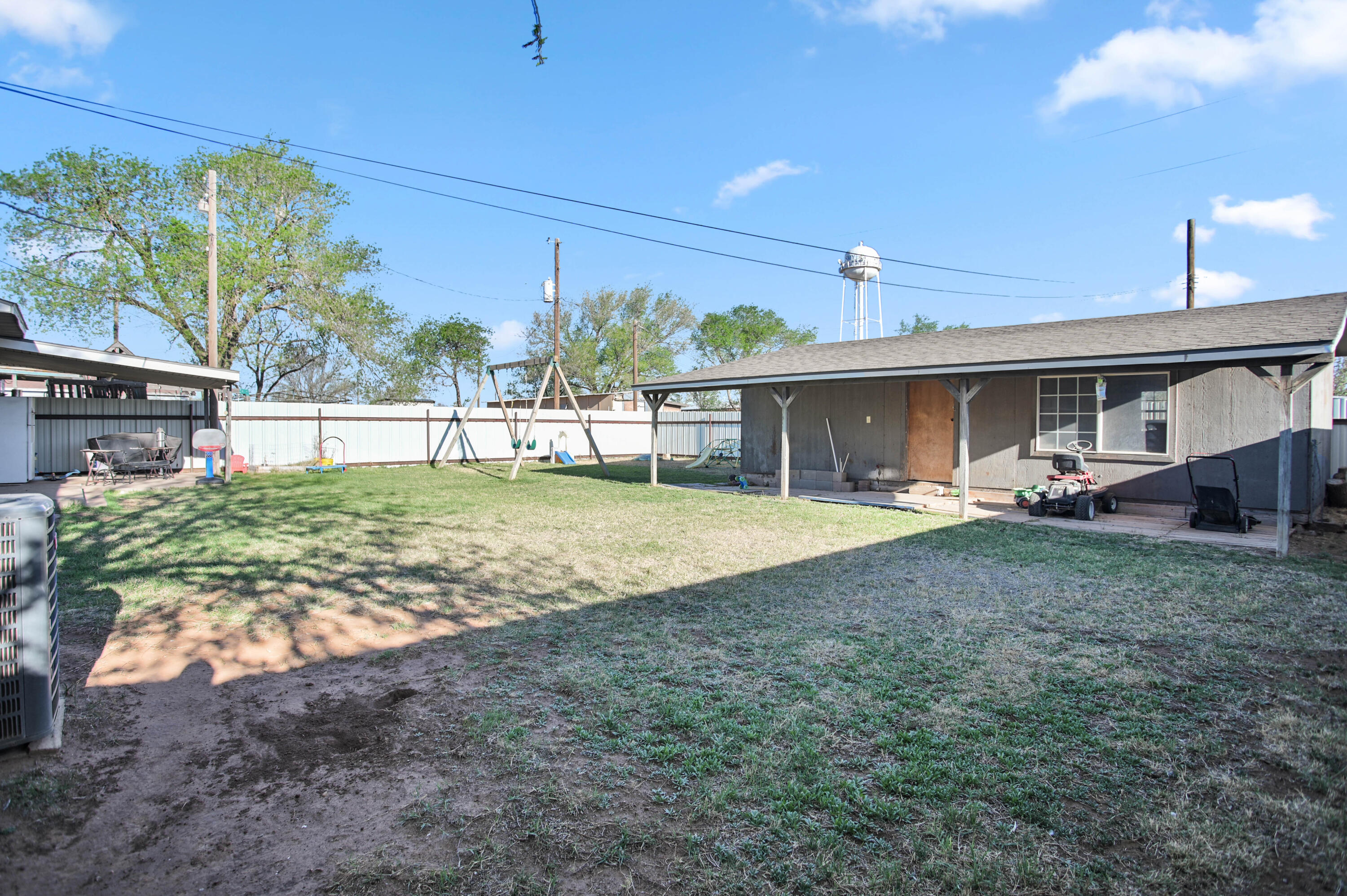 704 4th Street Smyer, TX 79367 - Photo 33 of 38 a view of a house with a yard