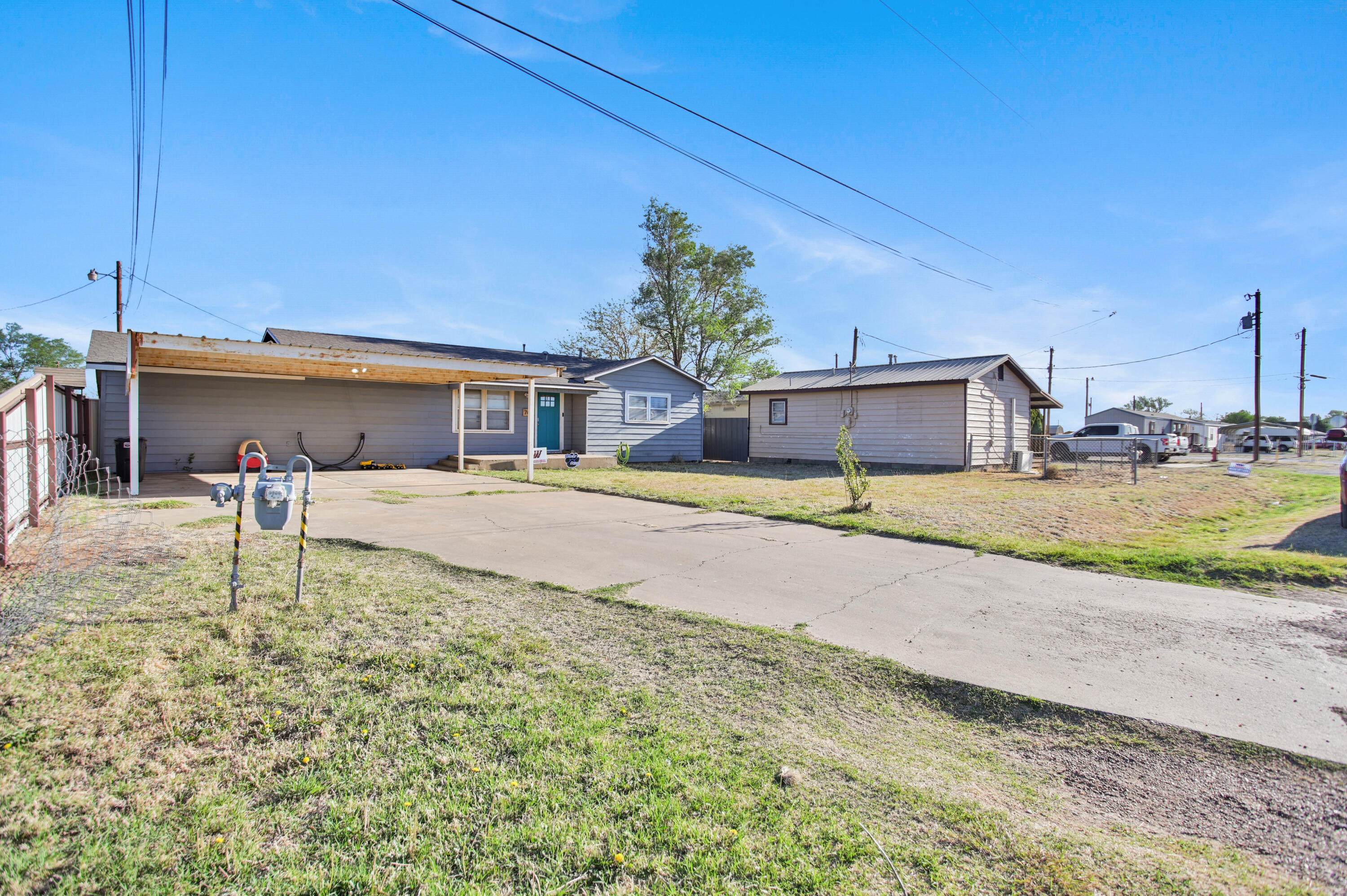 704 4th Street Smyer, TX 79367 - Photo 38 of 38 a front view of a house with garden