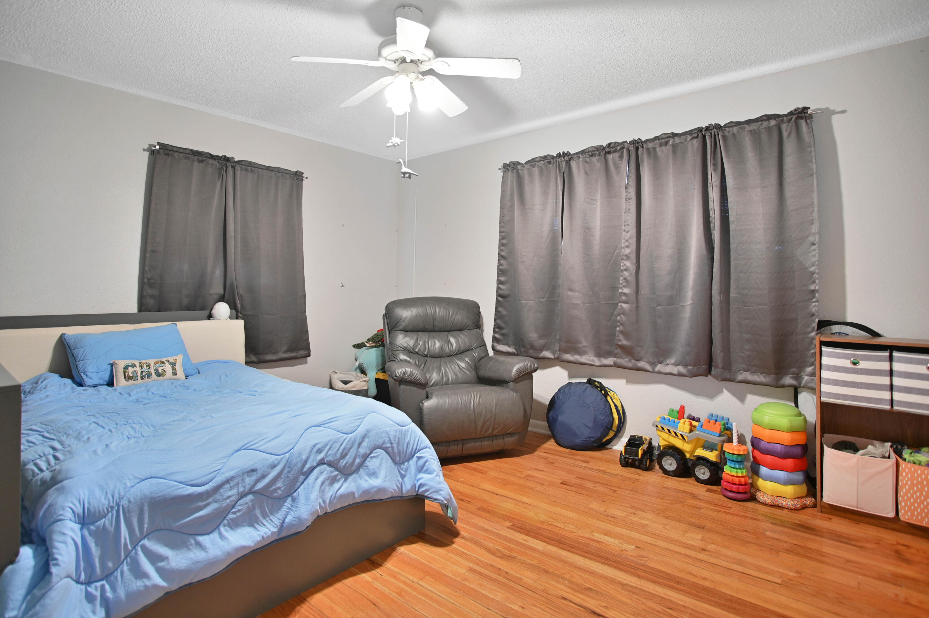 704 4th Street Smyer, TX 79367 - Photo 8 of 38 a bedroom with bed and window