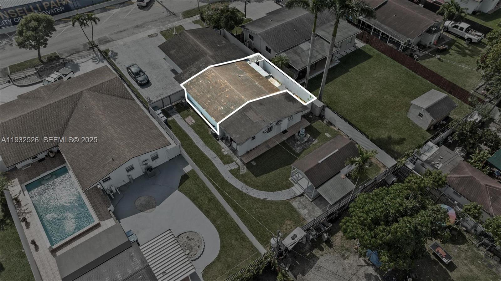 11441 Southwest 2nd Street, Unit 11443 Sweetwater, FL 33174 - Photo 27 of 31 an aerial view of a house with a yard