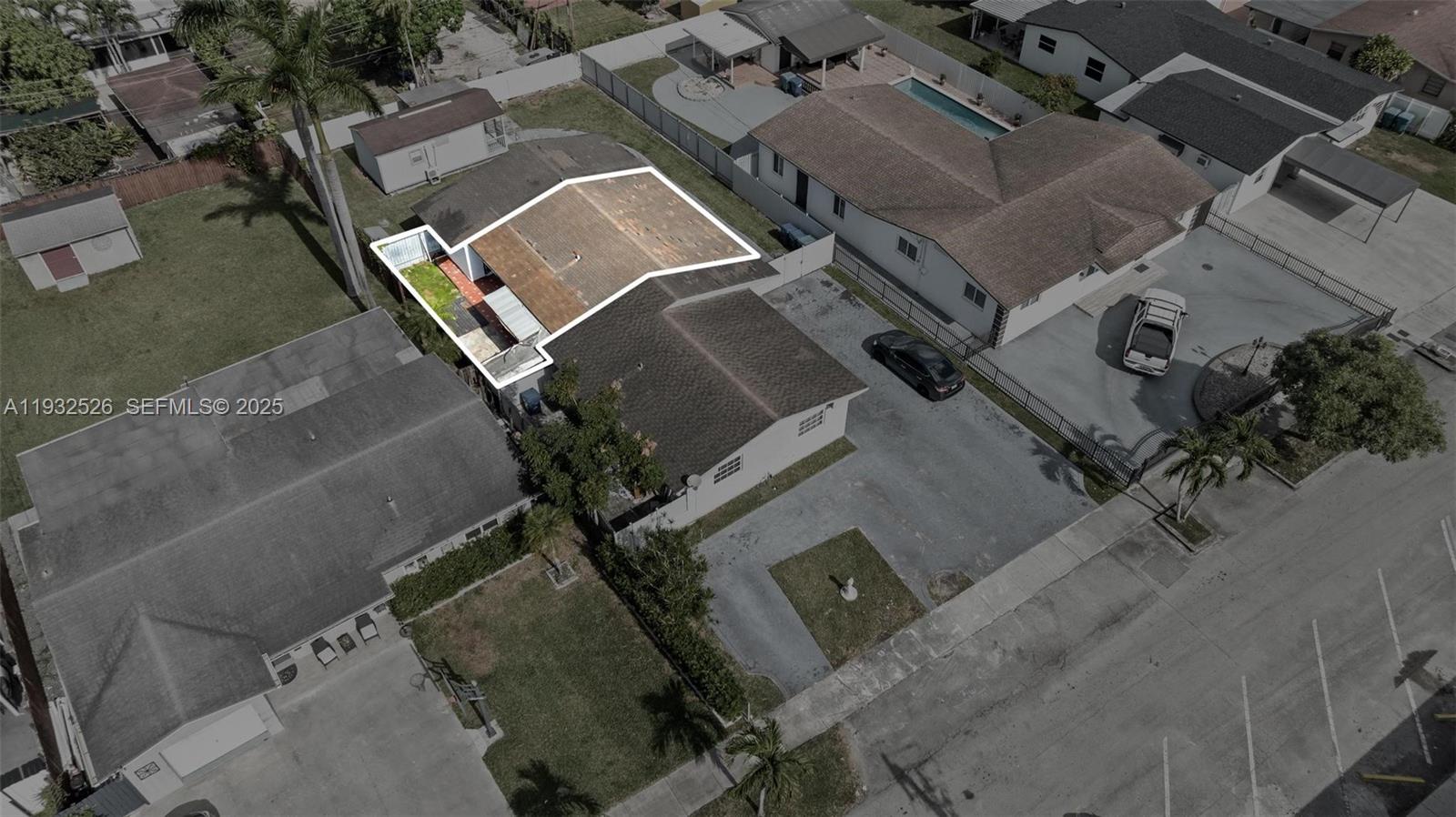 11441 Southwest 2nd Street, Unit 11443 Sweetwater, FL 33174 - Photo 29 of 31 an aerial view of a house with a yard