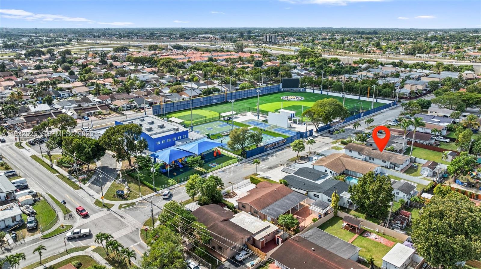11441 Southwest 2nd Street, Unit 11443 Sweetwater, FL 33174 - Photo 31 of 31 an aerial view of residential houses with outdoor space