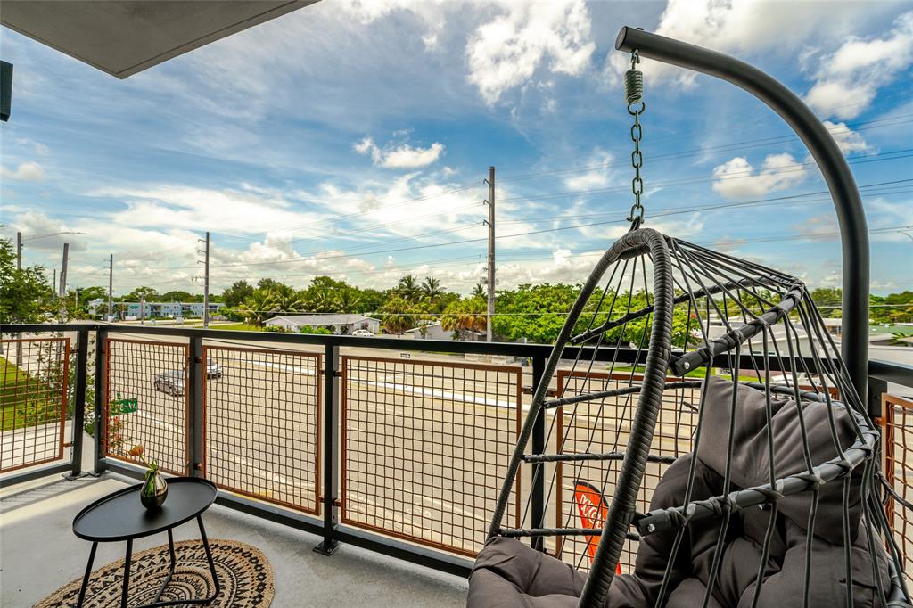 2750 Griffin Road, Unit 309 Fort Lauderdale, FL 33312 - Photo 3 of 47 a view of a balcony with furniture