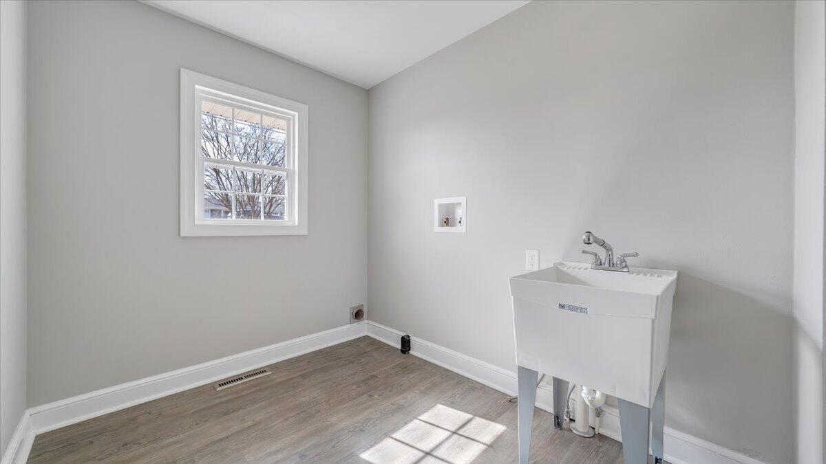 200 Cornell Road Rocky Mount, VA 24151 - Photo 14 of 44 a view of a small space with wooden floor and a sink