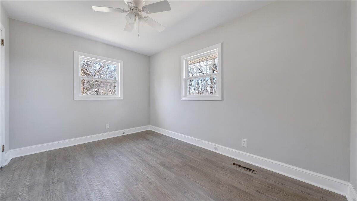 200 Cornell Road Rocky Mount, VA 24151 - Photo 20 of 44 wooden floor in an empty room with a window