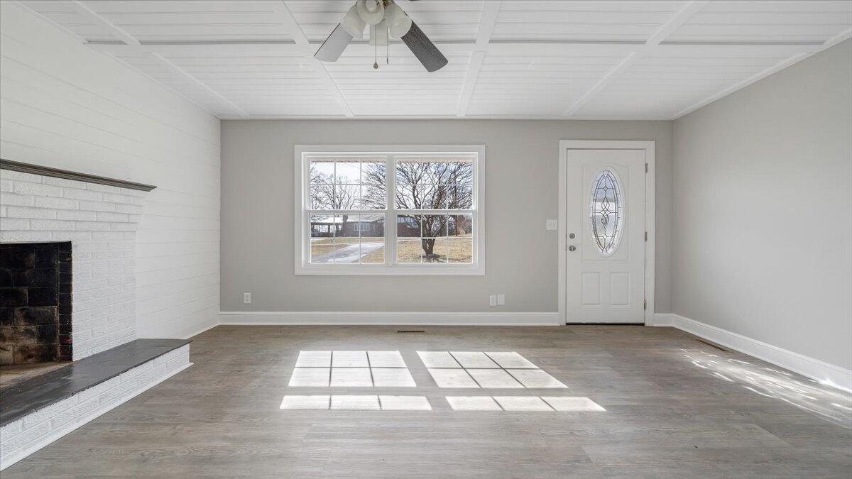 200 Cornell Road Rocky Mount, VA 24151 - Photo 2 of 44 an empty room with windows and fireplace