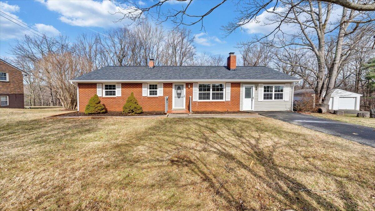 200 Cornell Road Rocky Mount, VA 24151 - Photo 34 of 44 a front view of a house with a yard