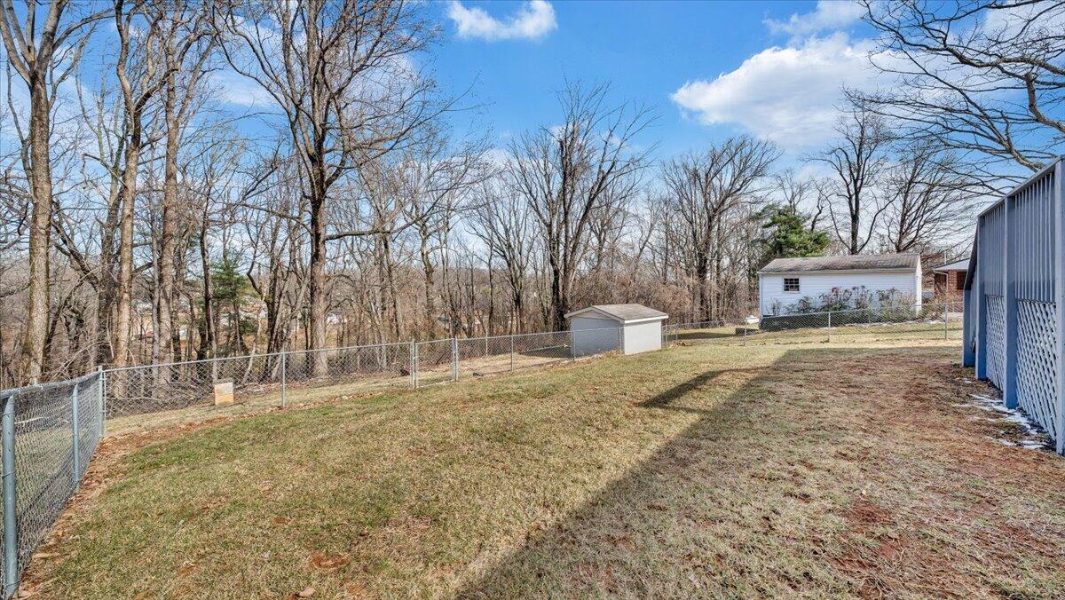 200 Cornell Road Rocky Mount, VA 24151 - Photo 38 of 44 a backyard of a house with large trees and outdoor space