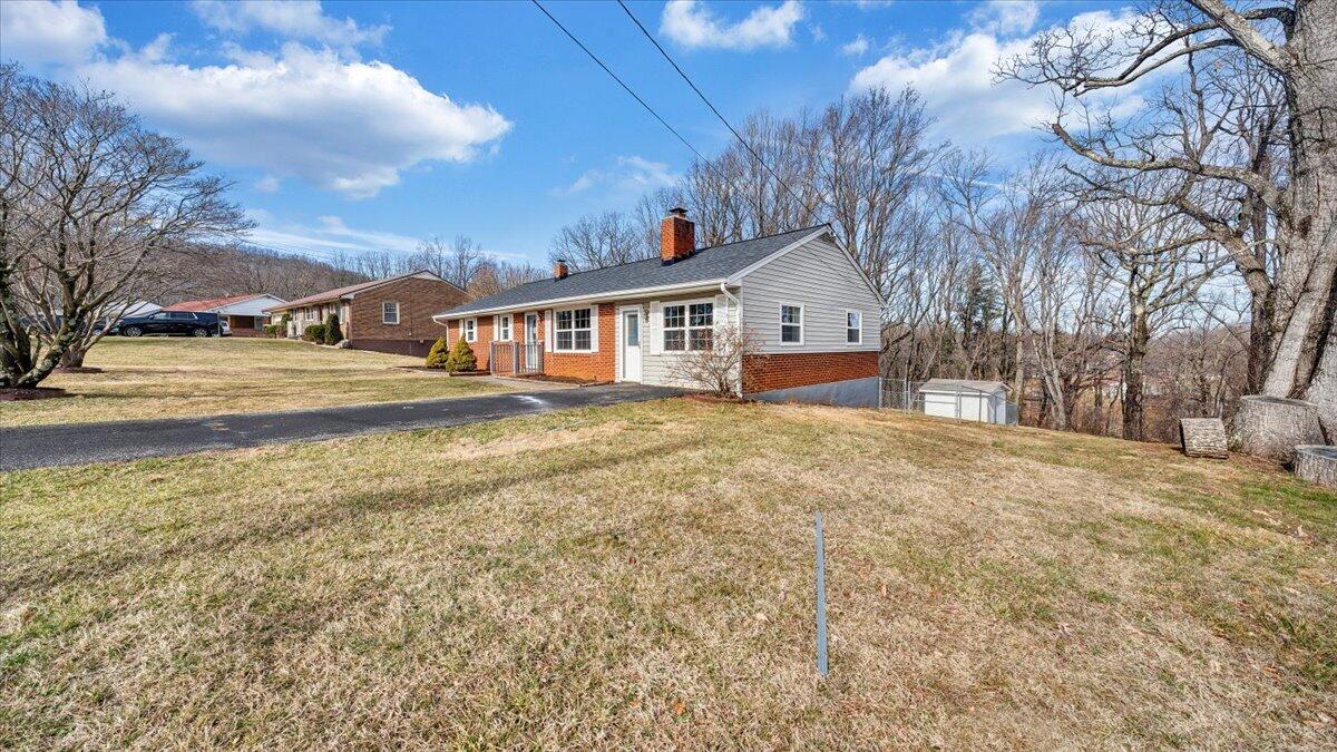 200 Cornell Road Rocky Mount, VA 24151 - Photo 40 of 44 a view of a house with a yard covered in snow