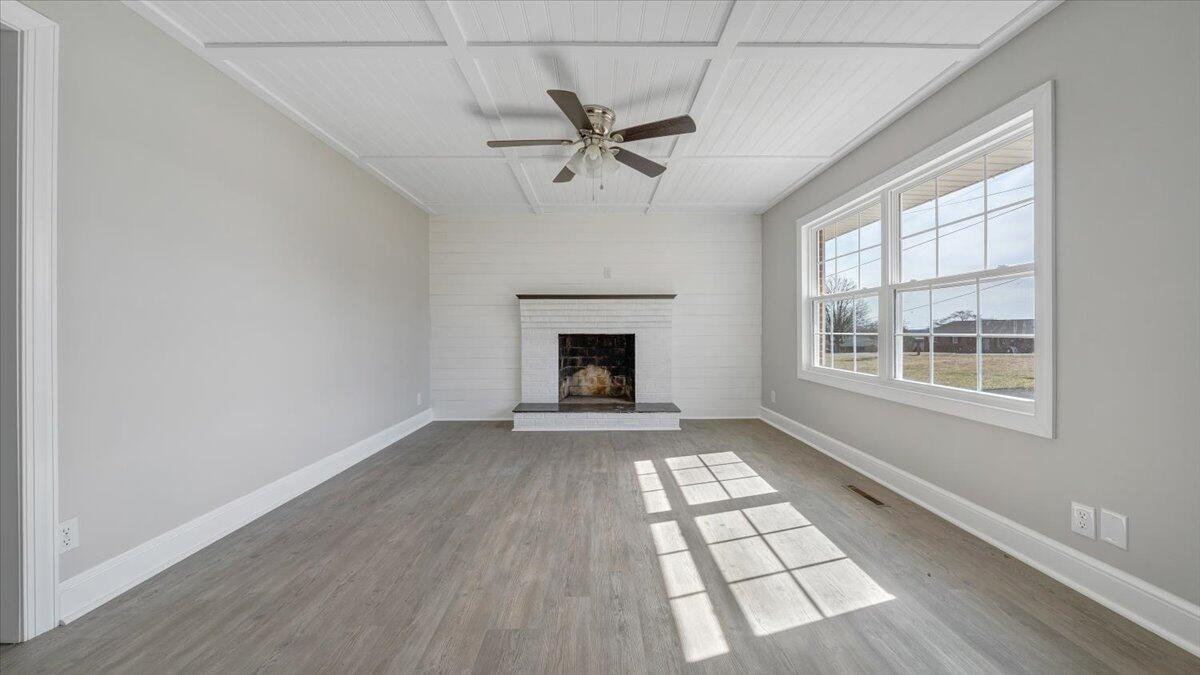 200 Cornell Road Rocky Mount, VA 24151 - Photo 4 of 44 an empty room with windows and fireplace