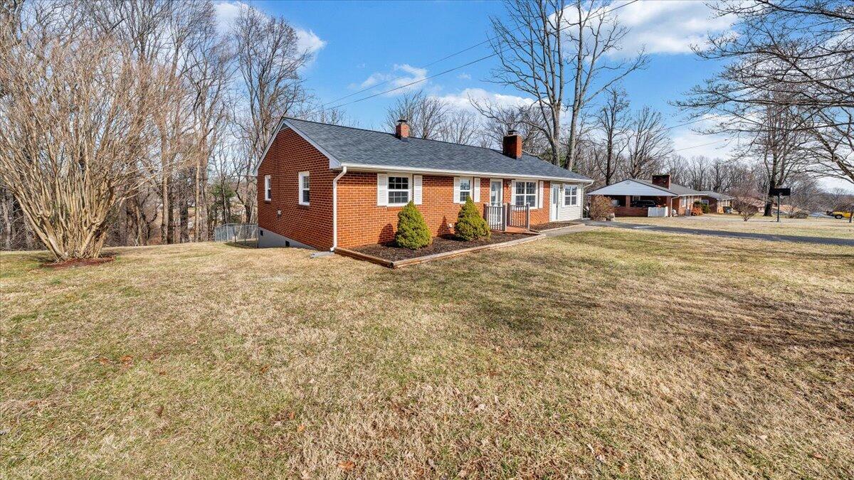 200 Cornell Road Rocky Mount, VA 24151 - Photo 42 of 44 a front view of a house with a yard