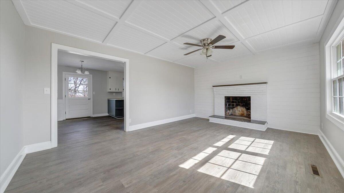200 Cornell Road Rocky Mount, VA 24151 - Photo 8 of 44 an empty room with windows and fireplace
