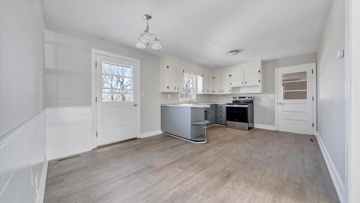 200 Cornell Road Rocky Mount, VA 24151 - Photo 9 of 44 a view of a kitchen with a sink cabinets and outdoor space