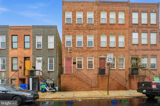 a front view of a building with street view