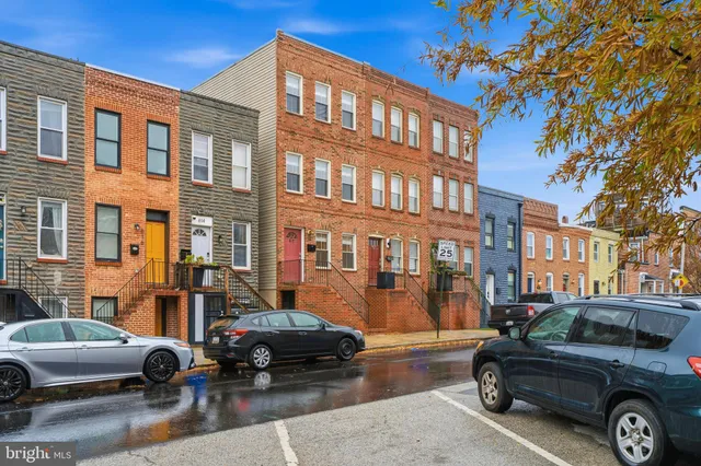a car parked in front of a building