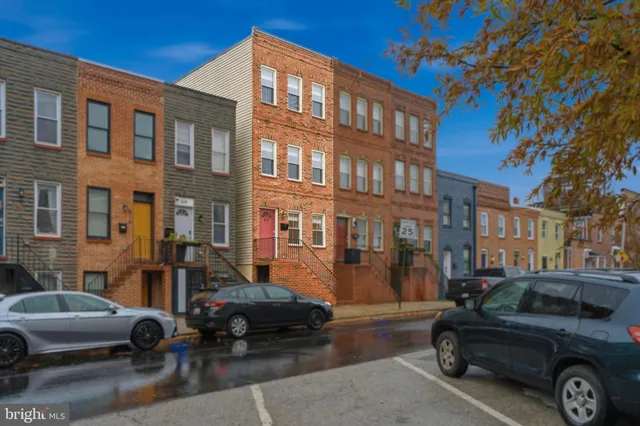 a car parked in front of a building