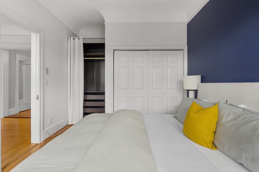 362 Commonwealth Avenue, Unit 4A Boston, MA 02115 - Photo 11 of 23 a bedroom with a bed and wall painting