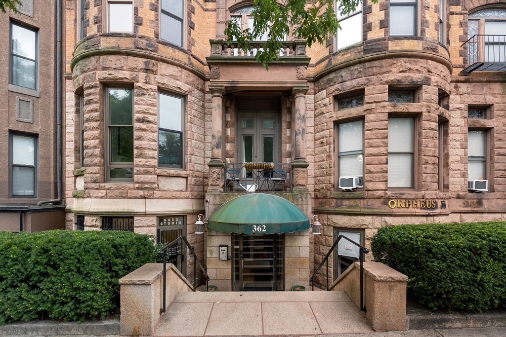 362 Commonwealth Avenue, Unit 4A Boston, MA 02115 - Photo 20 of 23 a front view of a building with a garden
