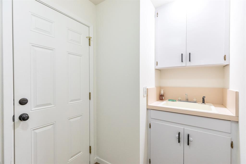 642 Fm 3200 Comanche, TX 76442 - Photo 27 of 37 a bathroom with a sink and a mirror