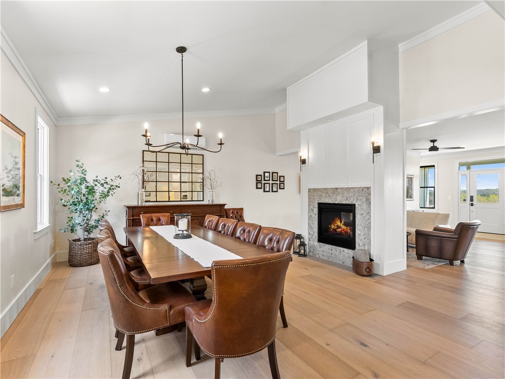 331 Bakerville Road Easley, SC 29642 - Photo 13 of 43 Elegant gathering space featuring a welcoming fireplace and abundant natural light.