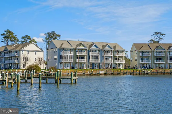 a front view of a building with lake view