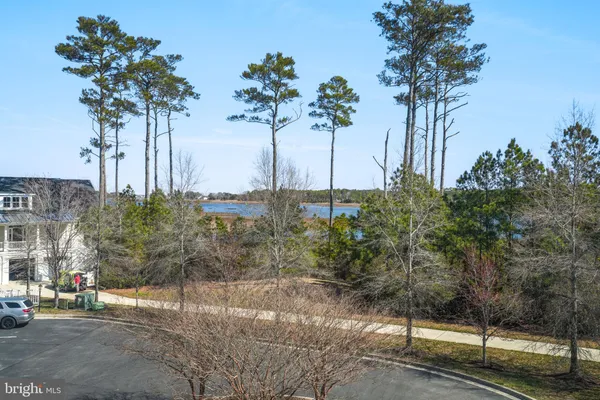 a kitchen with stainless steel appliances granite countertop a stove a refrigerator and a microwave