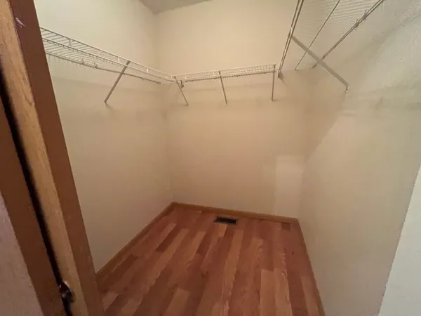 a view of a room with racks on the wall