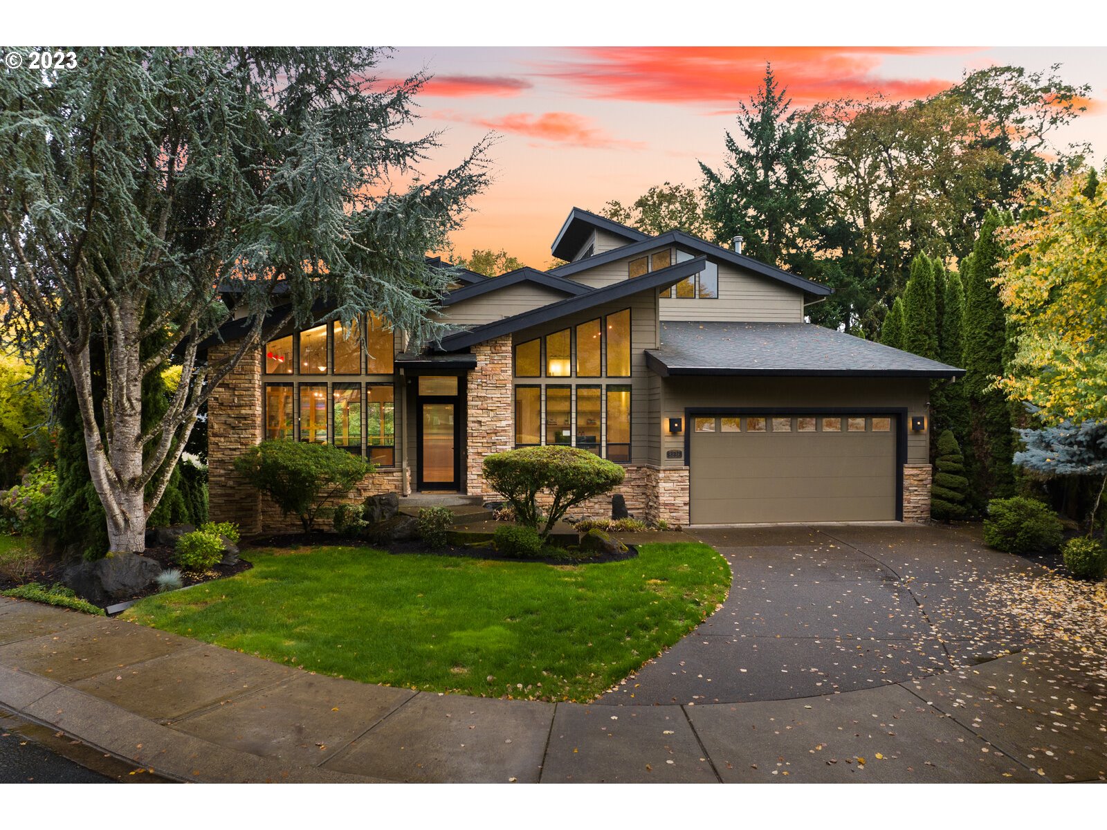 3236 Ridge Pointe Drive Forest Grove, OR 97116 - Photo 1 of 47 a front view of a house with a garden and yard