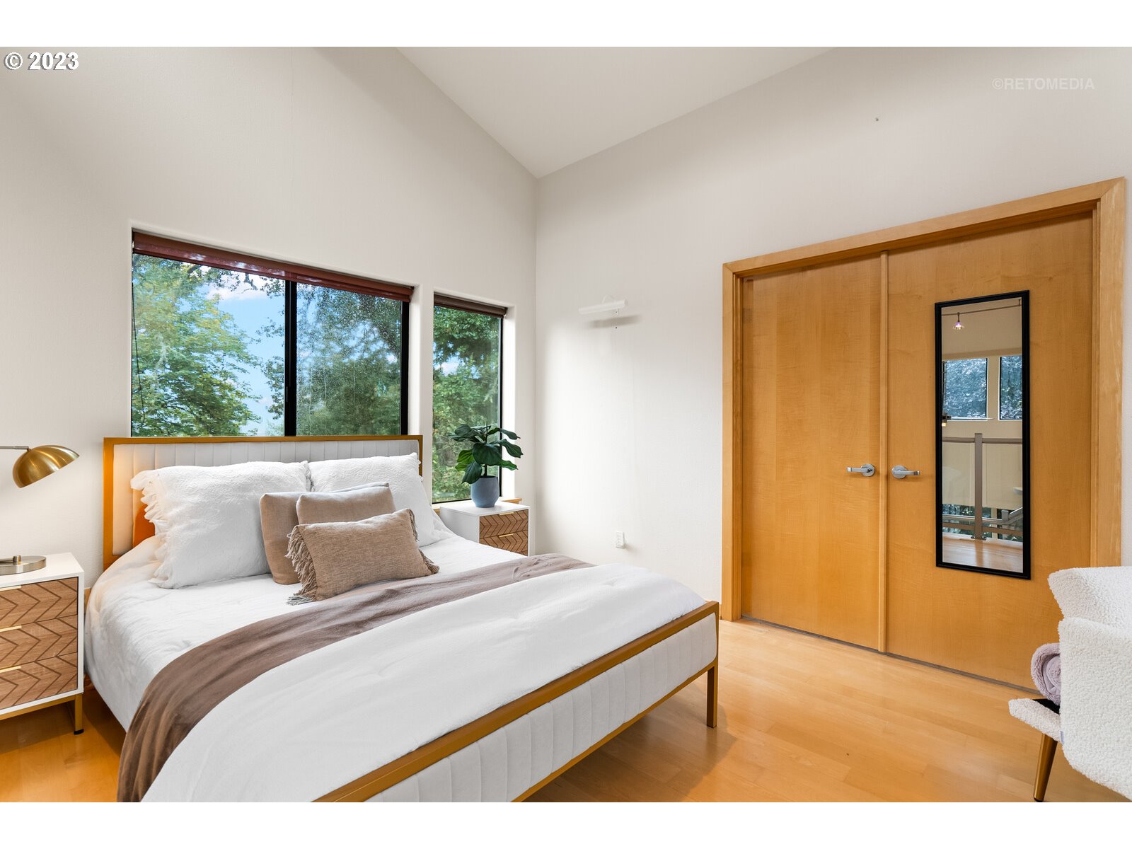 3236 Ridge Pointe Drive Forest Grove, OR 97116 - Photo 25 of 47 a bedroom with a large bed and a large window