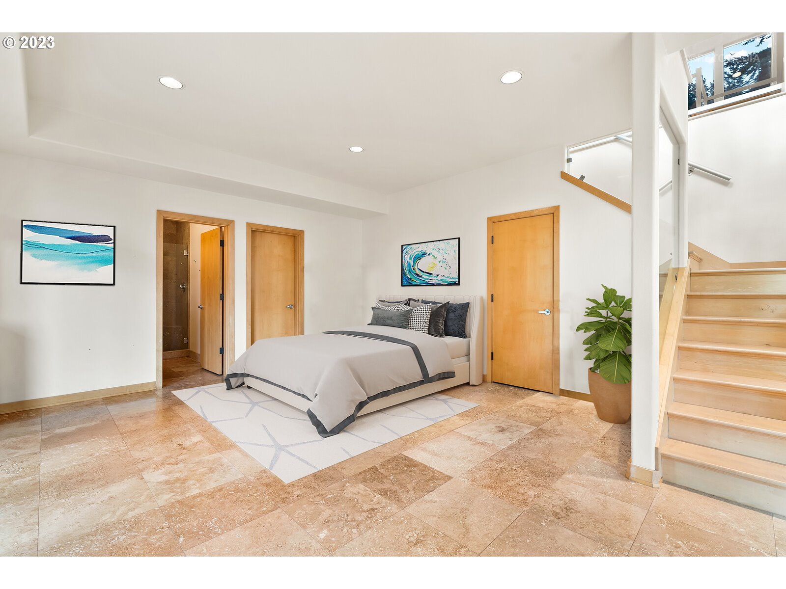 3236 Ridge Pointe Drive Forest Grove, OR 97116 - Photo 31 of 47 a spacious bedroom with a large bed and a potted plant